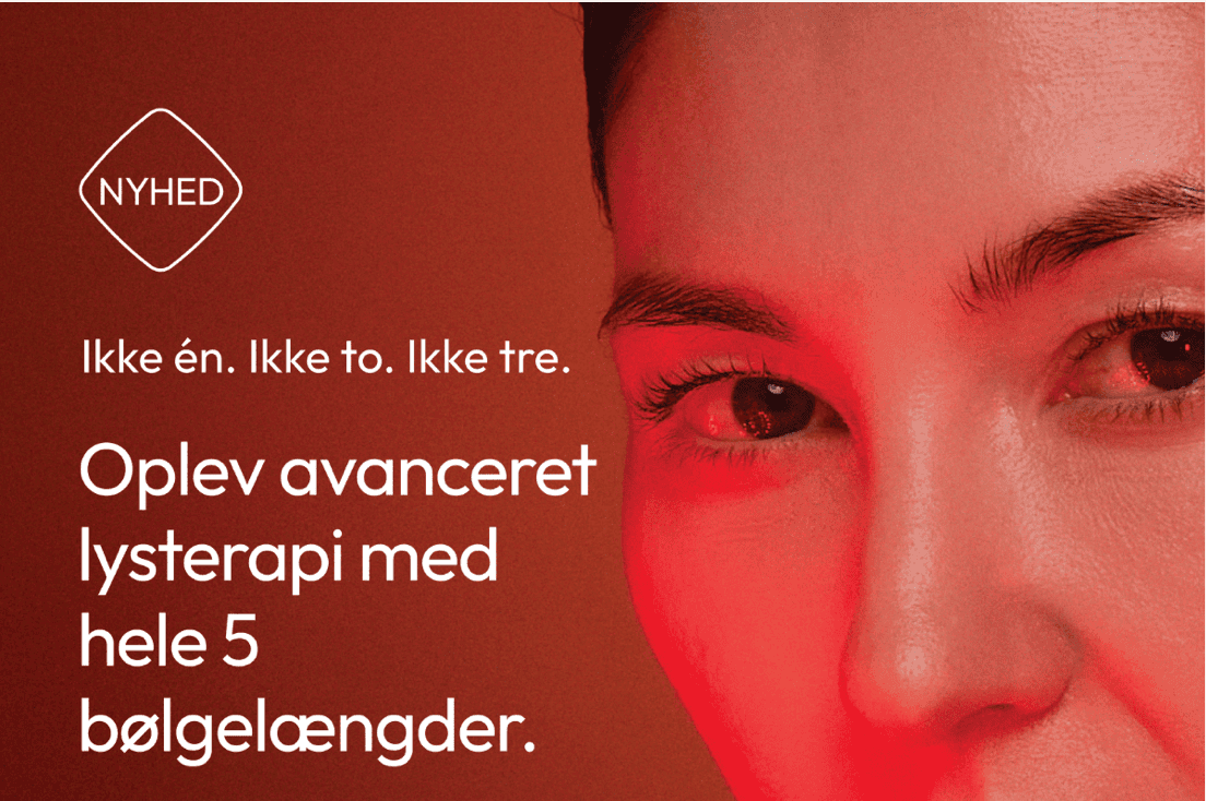 Nærbillede af en kvindes ansigt belyst med rødt lys og tekst om Environs nye LED-lysterapi med fem bølgelængder.